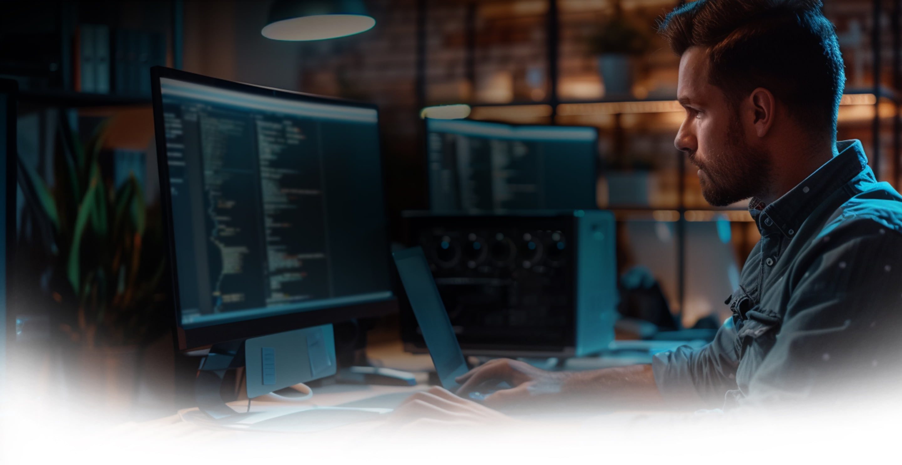 Software engineer at the office of a company providing application modernization services