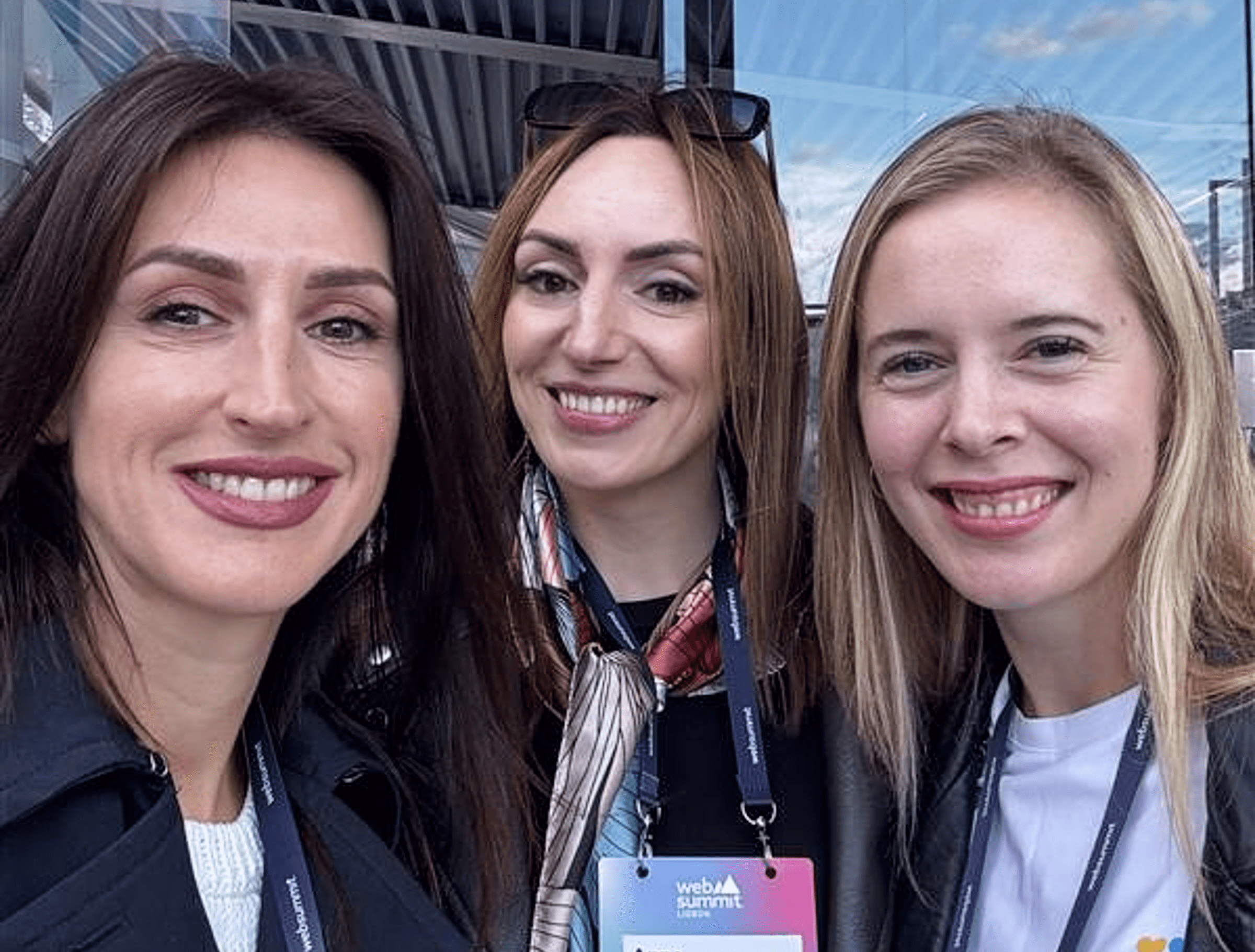 Alexandra Govorukha meeting colleagues from IdeaSoft and Sigma Technology at Web Summit 2024